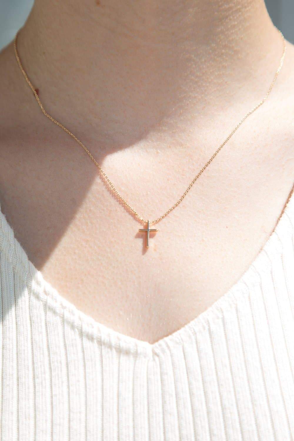 Gold mini 2024 cross necklace